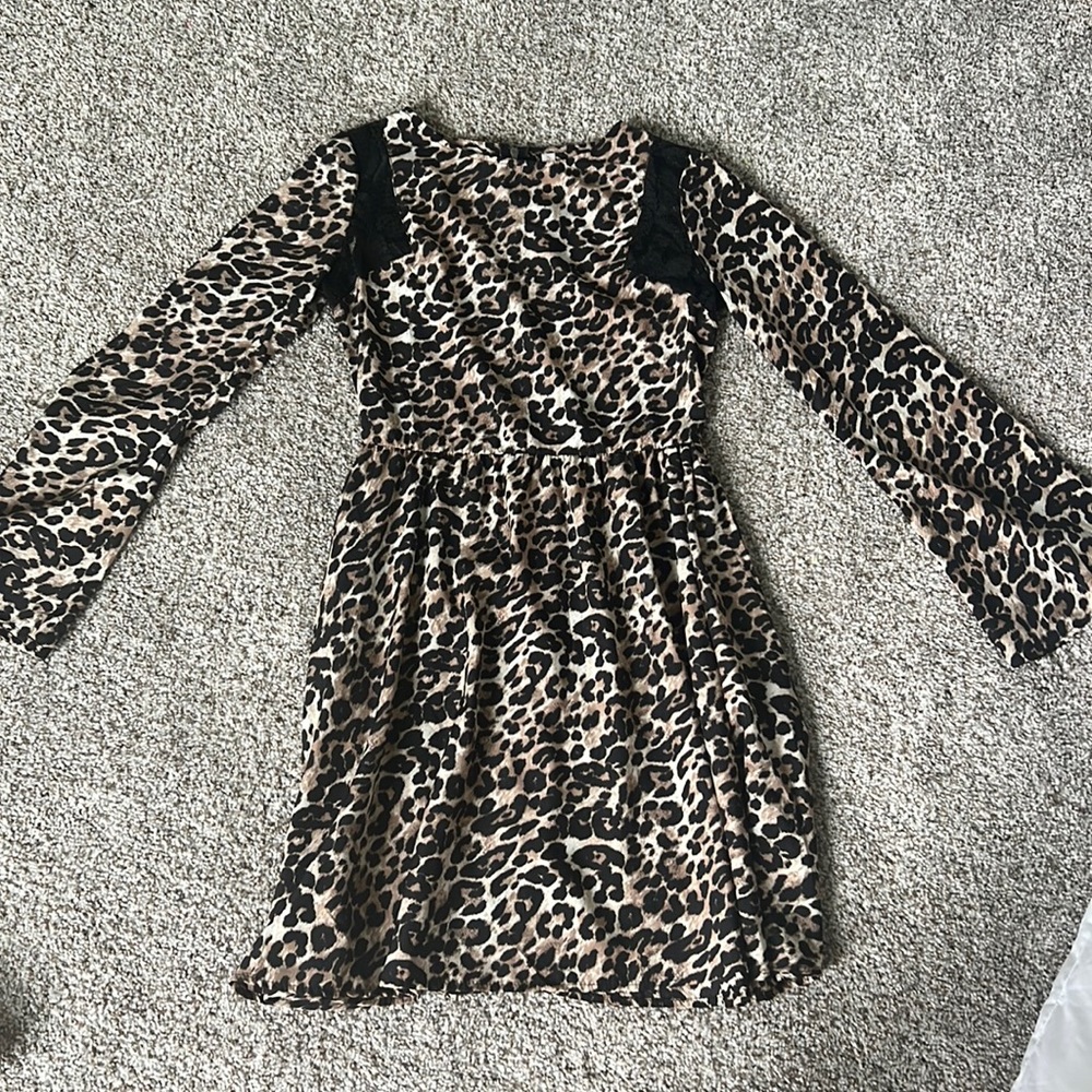 Cheetah dress. Worn once. Lace on shoulders.